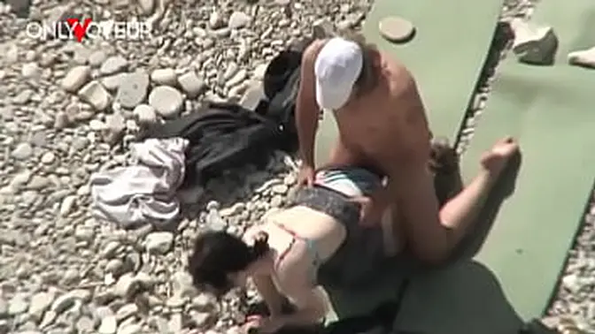 Beach Voyeur  Unashamed nudists having sex on the beach right near others