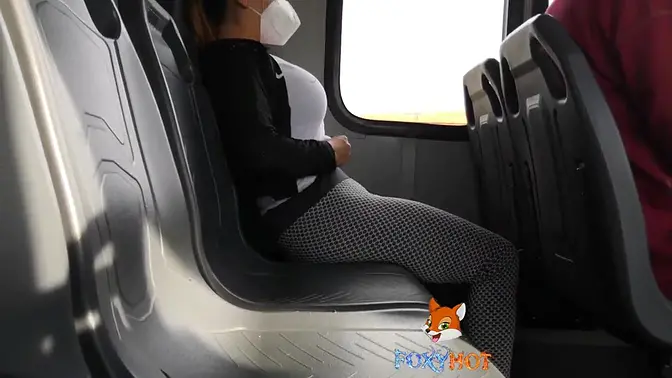 Latina MILF shows big tits and ass on public beach