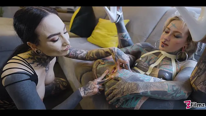 Burlesque beauty rides cock with a strap-on