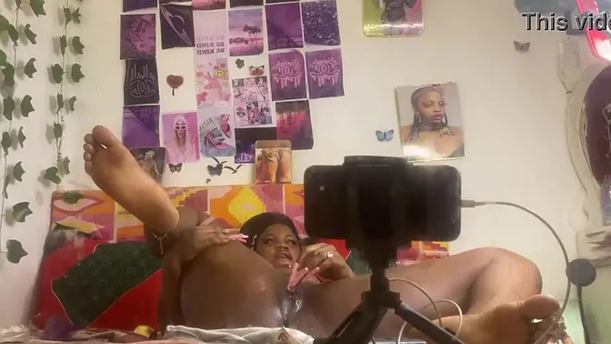 Girl fingerfucks herself doggystyle with a dildo