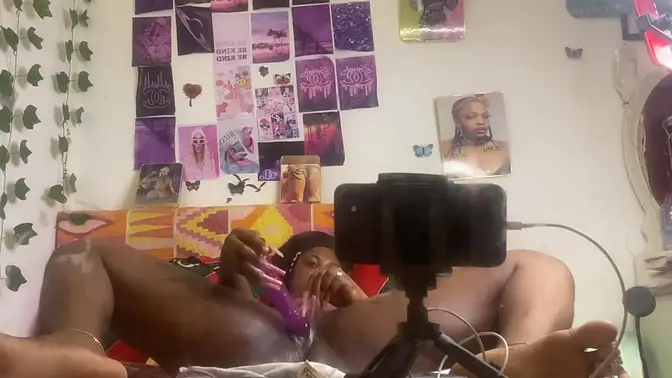 Girl fingerfucks herself doggystyle with a dildo