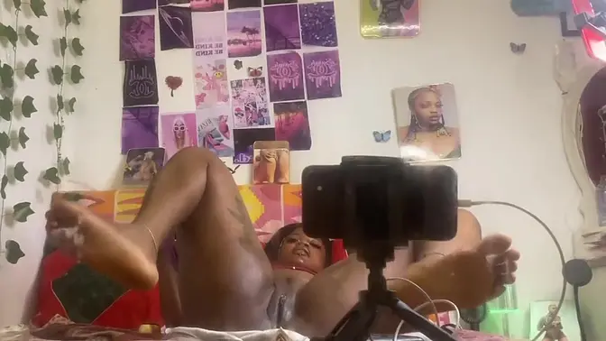 Girl fingerfucks herself doggystyle with a dildo