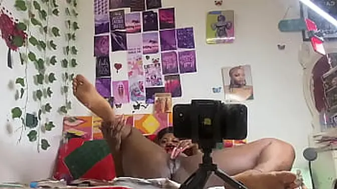 Girl fingerfucks herself doggystyle with a dildo