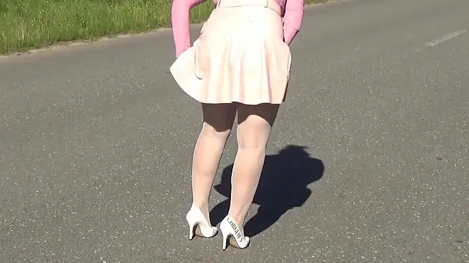 Beautiful blonde MILF in glasses teases with pantyhose-clad legs