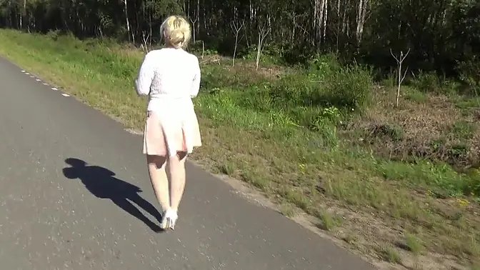 Beautiful blonde MILF in glasses teases with pantyhose-clad legs