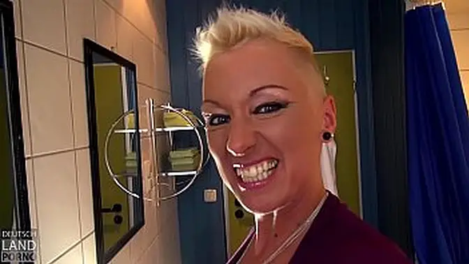 German babe Mandy Mistery shows off her assets