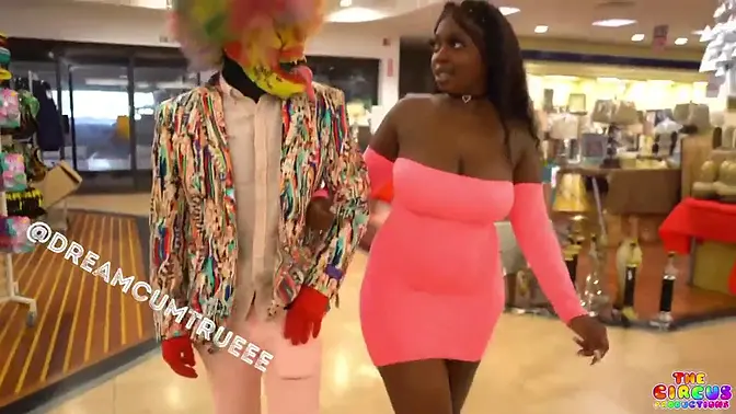Gibby the clown's ebony babe gives a rough blowjob