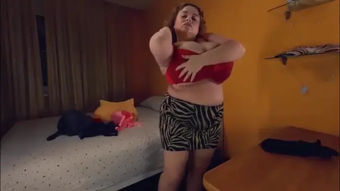 Busty MILF shows off her huge tits