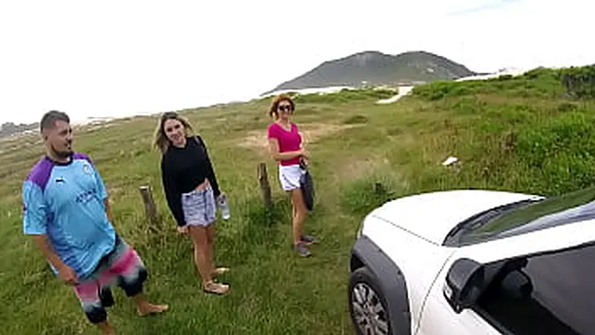 Couple swaps at the seaside, watched by big asses