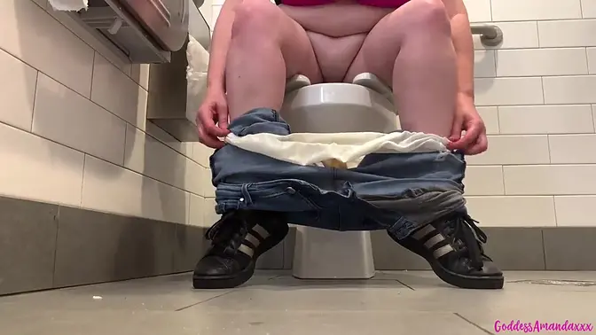 Busty MILF pees while showing off huge boobs and sweaty feet