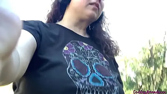 Busty MILF pees while showing off huge boobs and sweaty feet