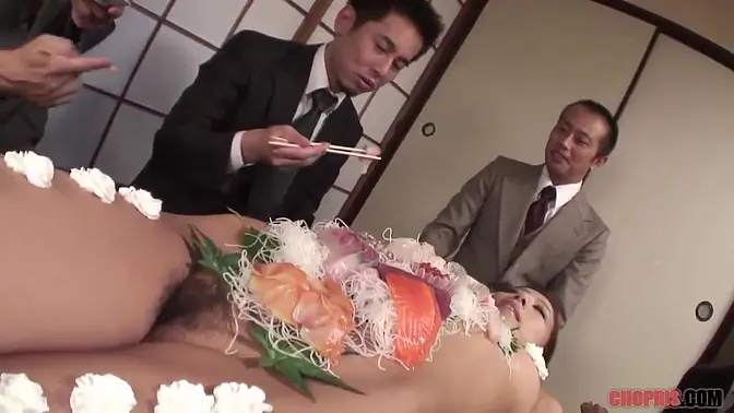 Blonde Japanese slut gets a facial while eating sushi