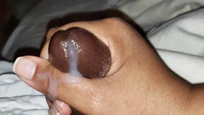 Thick ebony dude strokes his massive black cock